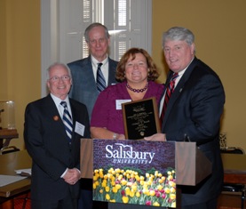  Drs. Fran Kane and Harry Basehart, co-directors of PACE; President Janet Dudley-Eshbach and Speaker Michael E. Busch.
